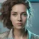 A split-screen portrait of a digital painting: the left half soft and waxy with blurred hair strands, the right half sharp with crisp skin texture and defined hair, lit by a cool studio light, i